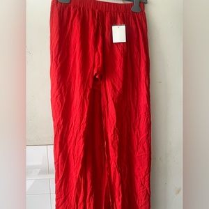 Red short attached to a dress